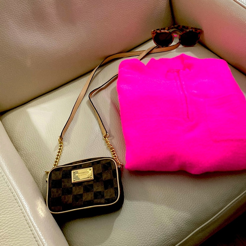 Mini crossbody big enough for phone money and lipstick.